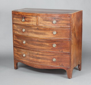 A Georgian crossbanded mahogany bow front chest of 2 short and 3 long drawers with replacement brass ring drop handles, raised on bracket feet 100cm h x 102cm w x 51cm d 