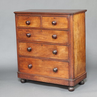 A Victorian mahogany D shaped chest of 2 short and 3 long drawers, raised on bun feet 114cm h x 102cm w x 48cm d 