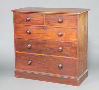 A Victorian mahogany D shaped chest of 2 short and 3 long drawers with turned handles 112cm h x 112cm x 51cm d  