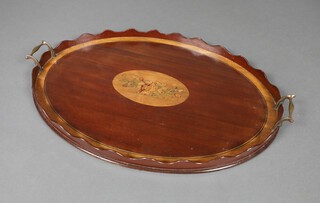 An Edwardian oval inlaid mahogany twin handled tea tray with wavy border and central inlaid floral panel 4cm h x 59cm w x 42cm d 