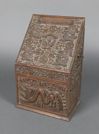 A 19th Century Anglo Chinese Country House style pillar letter box of wedge form, with heavily carved dragon decoration and armorial to the centre, complete with key 40cm h x 27cm w x 19cm d 