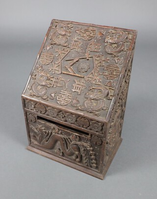 A 19th Century Anglo Indian hardwood country house style wedge shaped letter box with armorial and carved dragon decoration 38cm h x 26cm w x 19cm d 