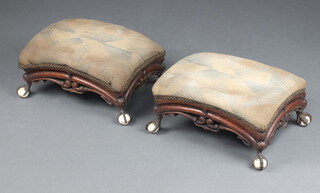 A pair of Victorian carved rosewood show frame stools on gilt metal and ceramic ball and claw supports 14cm h x 32cm w x 23cm d 