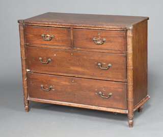 A 19th Century pine chest with faux bamboo columns to the sides fitted 2 short and 2 long drawers with brass escutcheons and replacement handles, raised on turned supports 79cm h x 99cm w x 46cm d 