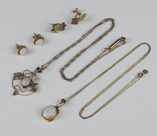 A 9ct yellow gold opal pendant and chain, a ditto pendant on a gilt chain, 2 pairs of yellow metal ear studs, gross weight 9 grams