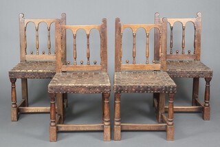 A set of 4 17th Century style oak rail back dining chairs with woven leather seats, raised on turned and block supports with H framed stretcher 89cm h x 47cm w x 41cm d 