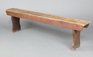 A 19th Century elm bench raised on splat supports 47cm h x 181cm l x 23cm w 