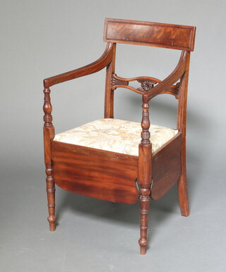 A 19th Century mahogany bar back open arm commode chair with carved mid rail and upholstered drop in seat, raised on turned supports 90cm h x 53cm w x 45cm d 