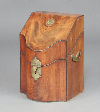 A Georgian mahogany knife box of serpentine outline with fitted interior and brass drop handles to the sides 33cm h x 22cm w x 16cm d 