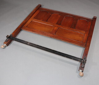 An oak panel end bedstead 131cm x 138cm