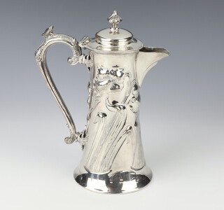 A stylish Art Nouveau silver plated jug decorated with flowers numbered 01212/3 25cm