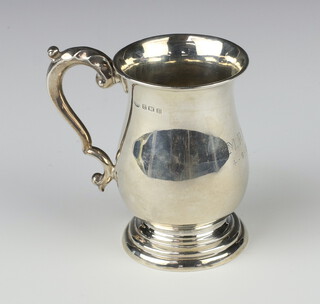 A silver baluster tankard with S scroll handle Birmingham 1930, engraved monogram, 86 grams, 9cm 