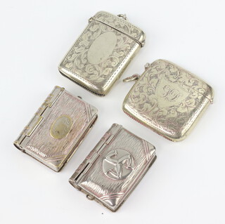 A silver plated Manx vesta in the form of a book and 3 other plated vestas 