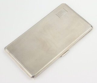 A silver engine turned rectangular cigarette case Birmingham 1943, engraved monogram, 241 grams gross 