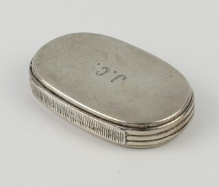 A Victorian oval silver pill box with patent hinge lid London 1884, 42 grams, engraved monogram, 55mm 