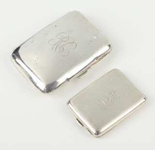 A silver cigarette case with engraved monogram Birmingham 1909, a ditto match sleeve with engraved monogram Birmingham 1924, gross weight 94 grams 