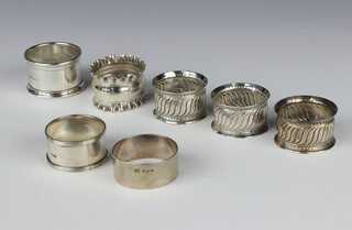 A silver napkin ring London 1924 and 6 others, 167 grams 