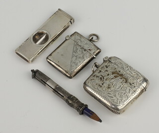 An Edwardian silver vesta Birmingham 1907 and 1 other Birmingham 1898 a ditto pencil and cigar cutter