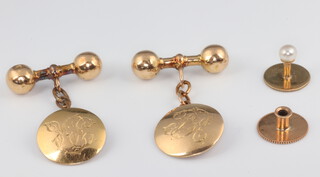 A pair of 15ct yellow gold monogrammed cufflinks and a ditto stud, gross weight 7.6 grams 