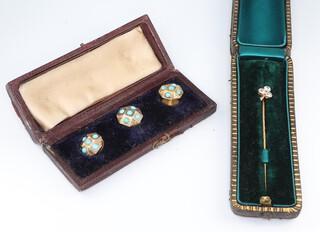 An Edwardian yellow metal 3 stone diamond tie pin, approx. 0.15ct, together with 3 turquoise and yellow metal studs, gross weight 5.5 grams, both cased 