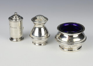 A silver cylindrical pepperette London 1952, 1 other and a mustard 88 grams