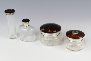 A silver and tortoiseshell powder jar Birmingham 1925, a ditto hair tidy, 2 similar mounted scents 