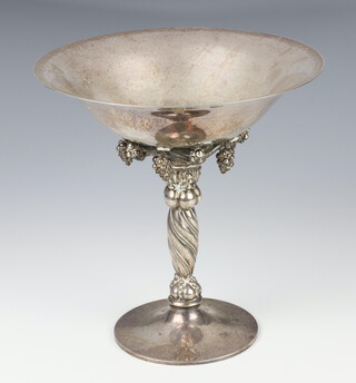 A Georg Jensen silver tazza with hammer pattern bowl and spiral stem with applied grape decoration no.263 B, 593 grams, 19.5cm  