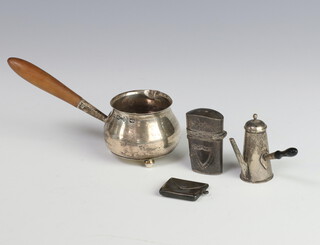 A Victorian silver miniature brandy warmer with turned wood handle Birmingham 1894, a miniature coffee pot, etui, silver stamp envelope with photograph frame to the reverse