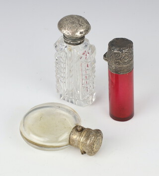 An Edwardian silver mounted ruby glass scent with stopper 7.5cm, 2 others 