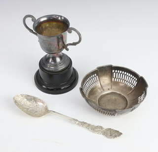 A Sterling circular bon bon dish with pierced decoration Birmingham 1921, a trophy cup and spoon, 94 grams