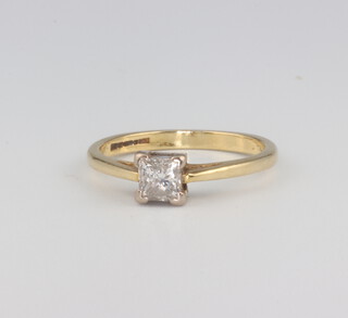 A yellow metal 18ct princess cut single stone diamond ring approx. 0.3ct, size L, 2.5 grams  