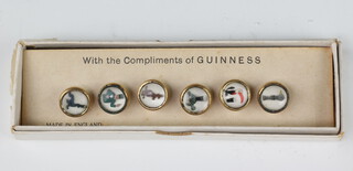 A set of 6 Guinness advertising buttons boxed 