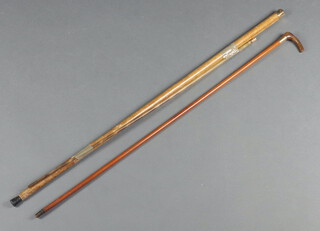 An Art Deco 9ct yellow gold mounted walking cane and 2 others