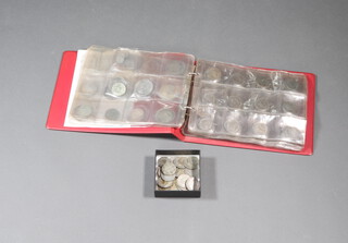 A quantity of pre-1947 UK coinage, 293 grams together with an album of mixed coins