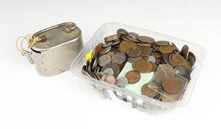 A quantity of world coins including a money bank 