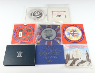 Five United Kingdom uncirculated coin sets - 1982, 1987, 1997 (x2) and 1998, 3 other cased sets