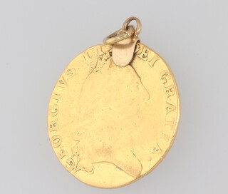 A spade guinea 1788, 8.6 grams, with soldered yellow metal mount 
