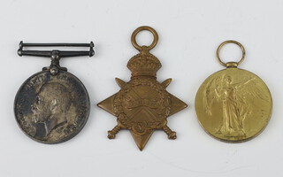 A World War One trio of medals comprising 1914-1915 star, War Medal and Victory Medal 3000.L.CPL.J.Levett.23/Lond.R. 