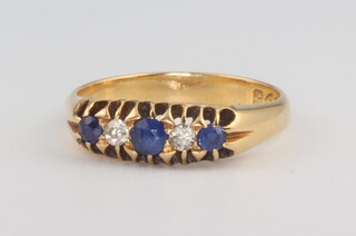 An 18ct yellow gold sapphire and diamond ring, size R 1/2, 5.2 grams 