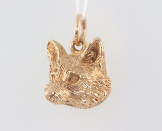 A 9ct yellow gold fox head pendant 7.5 grams 