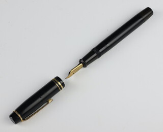 An Onoto/Magna black fountain pen with 14ct nib 