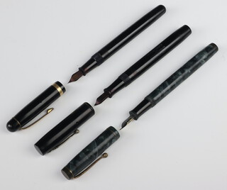 A De La Rue blue marble fountain pen with 14ct yellow gold nib, a Waterman black cased Ideal fountain pen with Ideal nib and a Pitmans Fono Deluxe black fountain pen with 14ct nib 