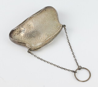 A silver hammer pattern purse with fitted interior Birmingham 1912