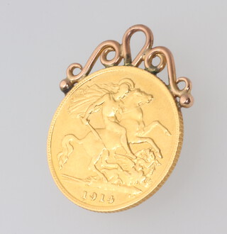 A half sovereign 1914 with a yellow metal mount 0.4 grams 