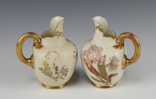 A pair of Victorian Royal Worcester blush ivory ground jugs, the base with purple Worcester mark, 1094, 13cm  