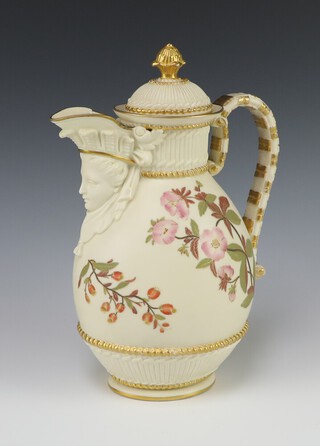 A Victorian Royal Worcester blush ivory and floral patterned ewer and lid with mask spout base with purple Worcester mark above a Z, 26cm h 