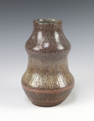 An Art Pottery double gourd shaped brown glazed vase with incised geometric decoration 19cm 