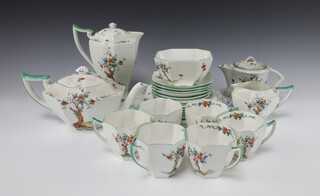 A Shelley 23 piece Crabtree tea service comprising teapot, hot water jug, cream jug, sugar bowl, twin handled plated, 6 tea plates (5 cracked), 6 cups and 6 saucers (2 cracked), bases marked Shelley Crabtree 11651, together with a similar Caughley teapot  