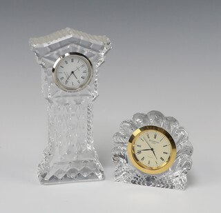 A Waterford Crystal glass timepiece contained in a scallop shaped case 7cm x 3cm x 1cm together with an Edinburgh Crystal timepiece in the form of a miniature longcase clock 14cm