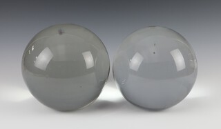 Two circular blown glass spheres 20cm 